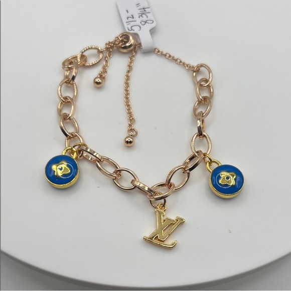 Louis Vuitton Gold Bracelet with Blue Charms - Picture 1 of 4